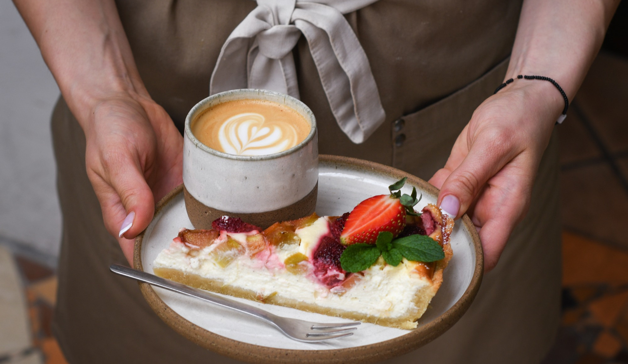 Curd tart with strawberries and rhubarb